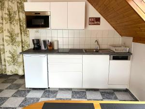 Kuchyňa alebo kuchynka v ubytovaní Cili's Apartments Vonyarcvashegy Balaton
