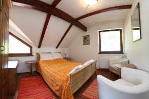 Un pat sau paturi într-o cameră la Vila Anastasia