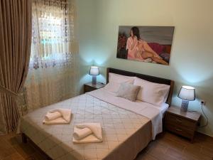 Ένα ή περισσότερα κρεβάτια σε δωμάτιο στο Holiday home in Nea Kallikratia