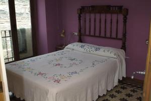 
Cama o camas de una habitación en Casa Rural El Clavel
