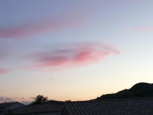 a lenticular cloud in the sky at sunset at EVANA in Bize-Minervois