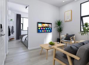 TV a/nebo společenská místnost v ubytování Xiamen 12 Seaside Hotel