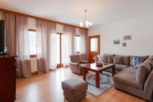 a living room with a couch and a table at Villa Old Town Stolac in Stolac