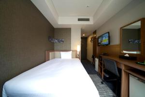 TV a/nebo společenská místnost v ubytování ibis Styles Tokyo Ginza