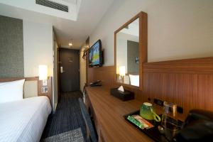 TV a/nebo společenská místnost v ubytování ibis Styles Tokyo Ginza