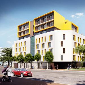 a building with a red car parked in front of it at Residhome Dijon Cité Des Vignes in Dijon