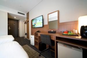 TV a/nebo společenská místnost v ubytování ibis Styles Tokyo Ginza