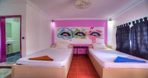 Llit o llits en una habitació de The Funky Village