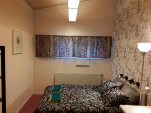 Letto o letti in una camera di Knihsgården