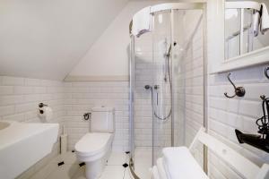 Kúpeľňa v ubytovaní Stare Sady Chillout Rooms "Pod Jabłoniami"