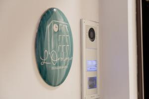 Certifikát, hodnocení, plakát nebo jiný dokument vystavený v ubytování L'Orologio Guest Rooms