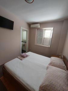Postel nebo postele na pokoji v ubytování Rooms Diana