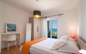 Postel nebo postele na pokoji v ubytování Lovely Apartment In Sutivan With Wifi