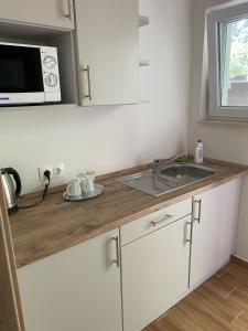 Cucina o angolo cottura di Liget Üdülőpark Fonyód