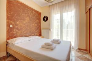 Postel nebo postele na pokoji v ubytování East City Living Apt - Netflix, Vesta Philoxenia