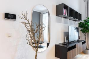 تلفاز و/أو أجهزة ترفيهية في Trendy apt with - smart TV, coffee machine in Meidling