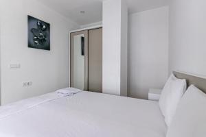 Ένα ή περισσότερα κρεβάτια σε δωμάτιο στο Oniks Comfort Suites +67 φωτογραφίες