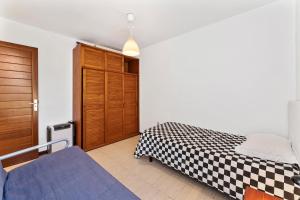 Łóżko lub łóżka w pokoju w obiekcie Villa Paula Costa Teguise