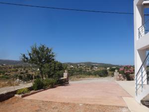 a view from the side of a house with a driveway at Theros house in Kythira