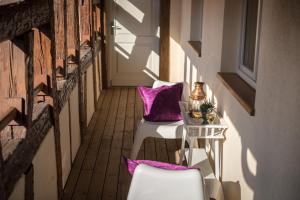 Posezení v ubytování Le Hameau d'Eguisheim - Chambres d'hôtes & Gîtes