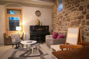 Posezení v ubytování Le Hameau d'Eguisheim - Chambres d'hôtes & Gîtes