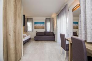 Postel nebo postele na pokoji v ubytování Armonia Resort