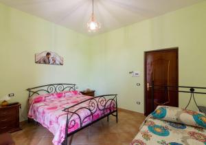 Кровать или кровати в номере Agriturismo Montagne Verdi - Irpinia