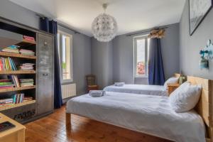 Posteľ alebo postele v izbe v ubytovaní Maison du Grichet - Piscine privée