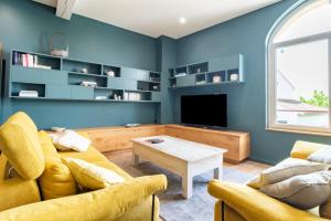 Posedenie v ubytovaní Maison du Grichet - Piscine privée