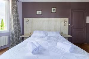 Posteľ alebo postele v izbe v ubytovaní Maison du Grichet - Piscine privée