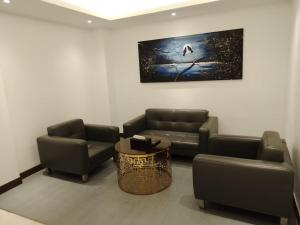 Posezení v ubytování Hotel X Rajshahi