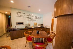 Cucina o angolo cottura di The Point Boutique Hotel
