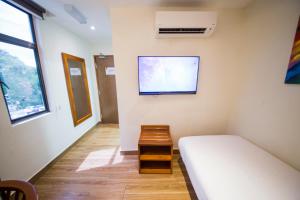 Letto o letti in una camera di The Point Boutique Hotel