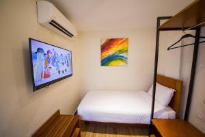 Letto o letti in una camera di The Point Boutique Hotel