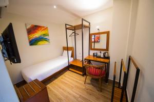 Postel nebo postele na pokoji v ubytování The Point Boutique Hotel + 37 fotografií