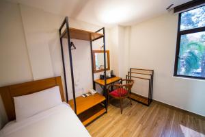 Letto o letti in una camera di The Point Boutique Hotel