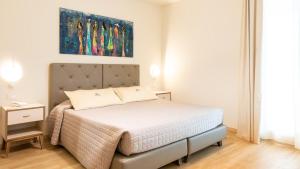 Postel nebo postele na pokoji v ubytování Hotel Atlantico