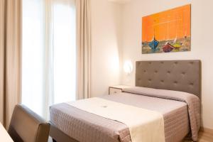 Postel nebo postele na pokoji v ubytování Hotel Atlantico