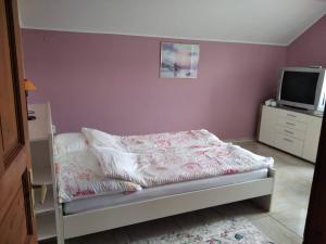 Posteľ alebo postele v izbe v ubytovaní Szemi ház