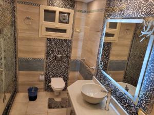 ห้องน้ำของ مراحب للاسكان الفندقي - منتجع سيسيليا / Maraheb Group For Hotel Accommodation - Cecelia Resort