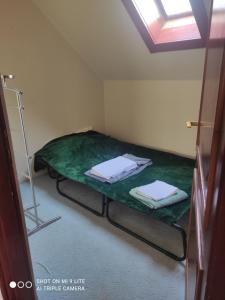 Posteľ alebo postele v izbe v ubytovaní Labdarozsa Apartmanhouse