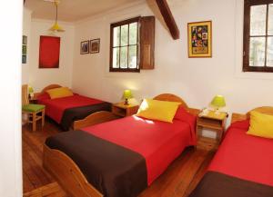 Postel nebo postele na pokoji v ubytování Hostal Rio Amazonas