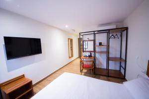 Letto o letti in una camera di The Point Boutique Hotel
