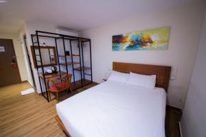 Letto o letti in una camera di The Point Boutique Hotel