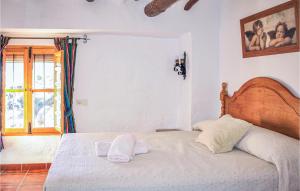 Posteľ alebo postele v izbe v ubytovaní Cozy Home In Villanueva Del Rosario