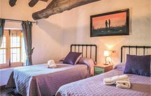 Posteľ alebo postele v izbe v ubytovaní Cozy Home In Villanueva Del Rosario