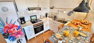 Kuchnia lub aneks kuchenny w obiekcie CASA LORO, Costa Calma