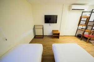 Letto o letti in una camera di The Point Boutique Hotel