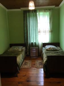 Letto o letti in una camera di Guest House Latali