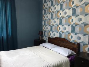 Letto o letti in una camera di Guest House Latali